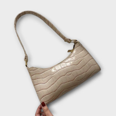 Aurora. - Glänzende Ledertasche